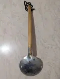 Шумовка з лакованим руків'ям